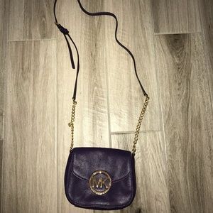 Small purple Michael Kors cross body purse